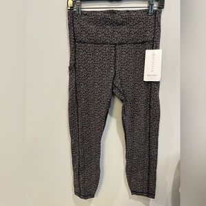 Athleta Ultimate Stash Tights 7/8 size M